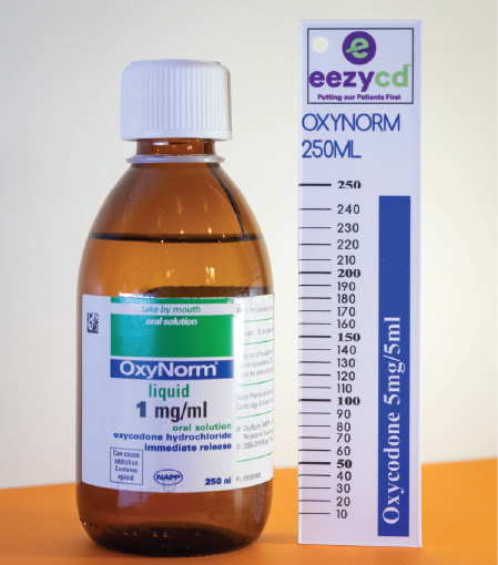 Brown bottle of OxyNorm liquid with white cap beside its tall 250 mL box labeled oxycodone 5 mg/5 mL.