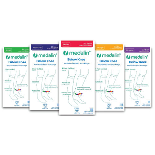Six Medalin below-knee anti-embolism stockings in assorted sizes, arranged in a row.