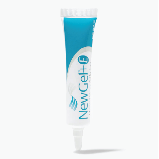 newgel wound care_2-8 Toothpaste tube labeled NewGel+E with a blue and white design, standing upright with a white cap at the bottom.